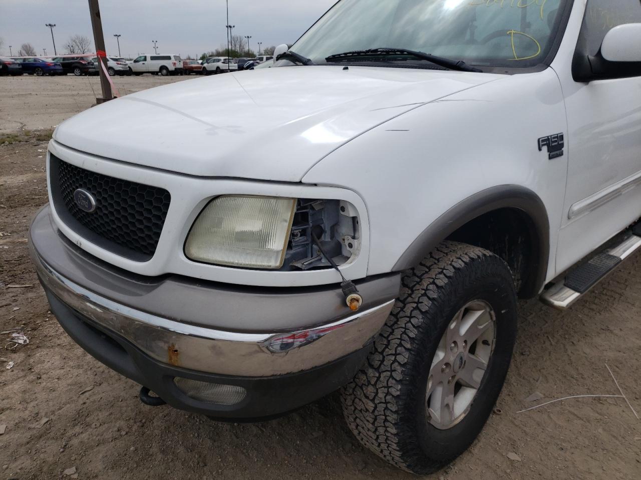 Photo 9 from auction – 2002 FORD F150 with VIN 1FTRX18L52NA84104