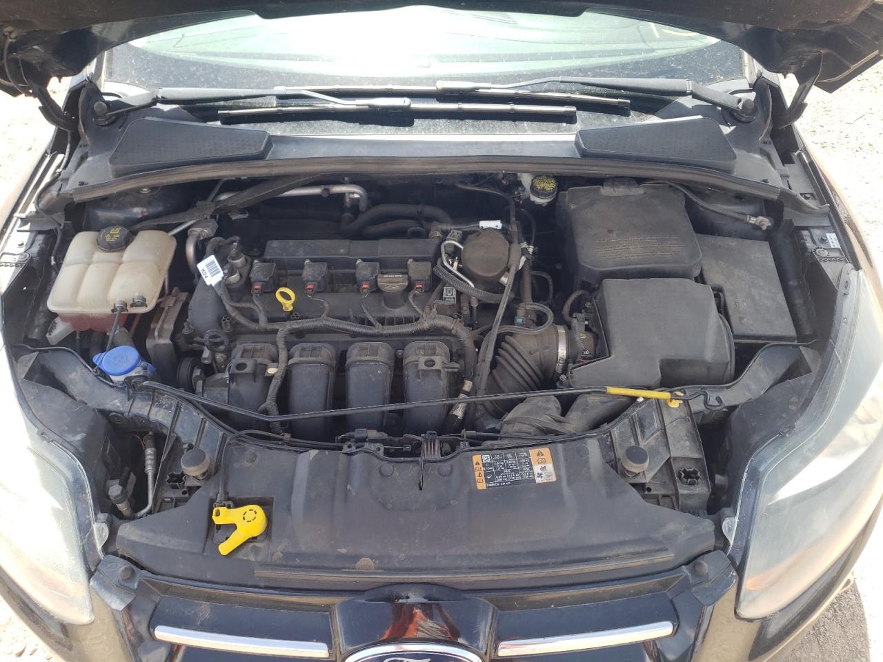 Photo 7 from auction – 2014 FORD FOCUS TITA with VIN 1FADP3J22EL276299