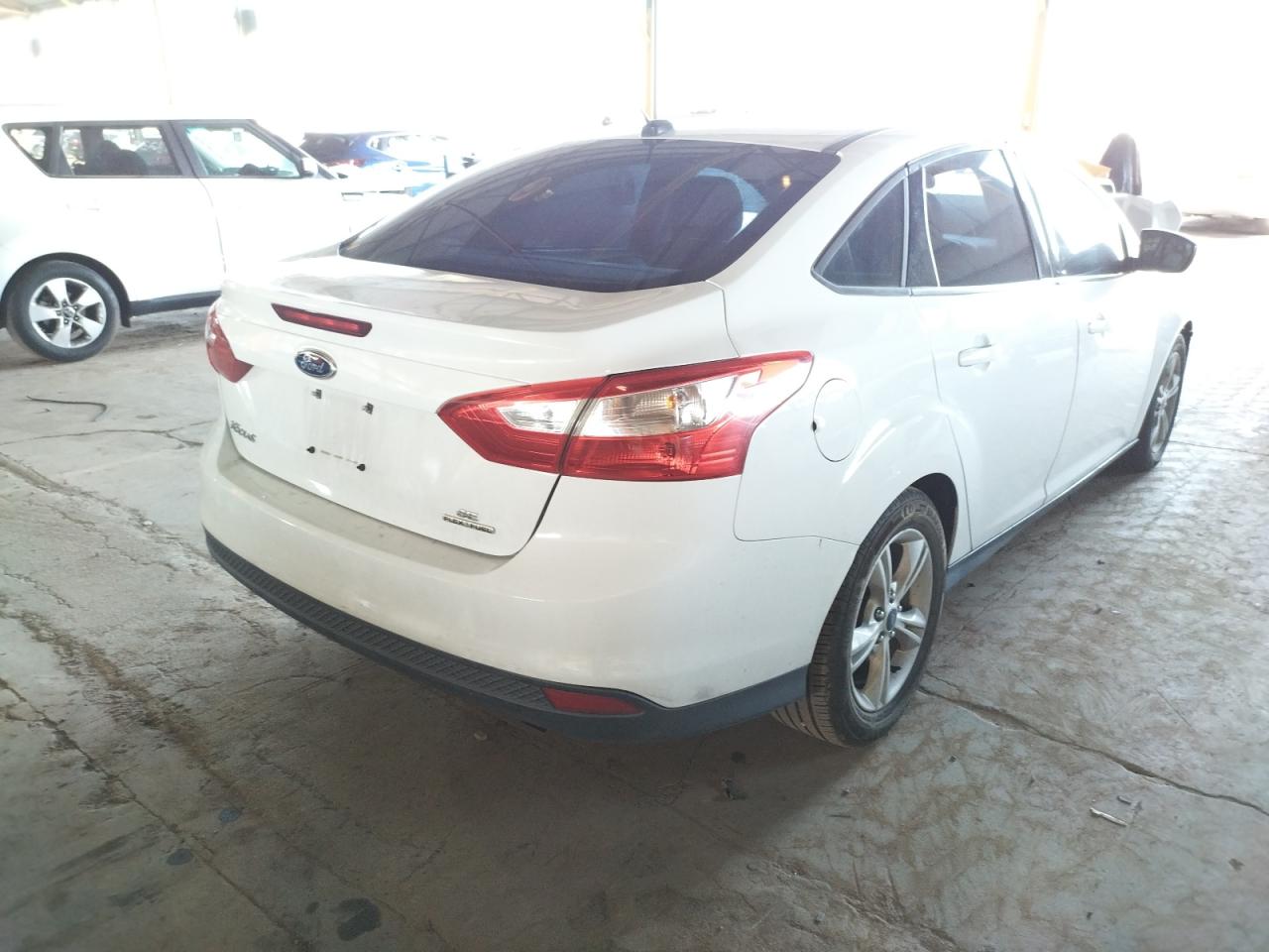 Photo 4 from auction – 2014 FORD FOCUS SE with VIN 1FADP3F25EL421084