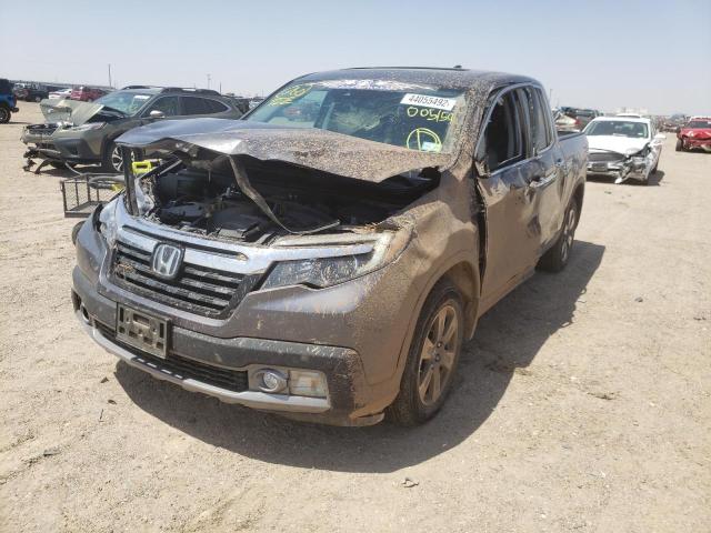Photo 2 from auction – 2019 HONDA RIDGELINE with VIN 5FPYK3F77KB005159