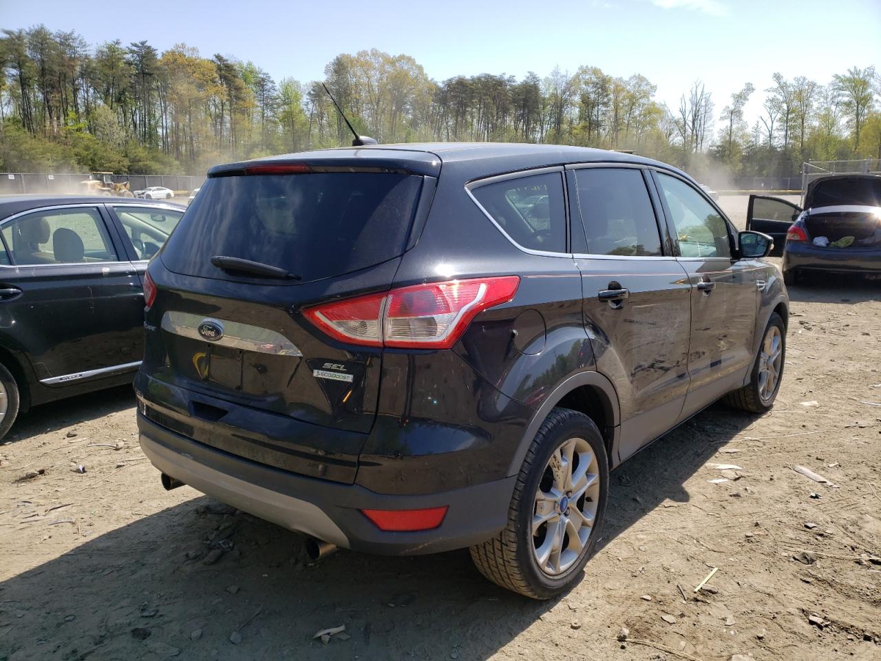 Photo 4 from auction – 2013 FORD ESCAPE SEL with VIN 1FMCU0HX5DUB13083