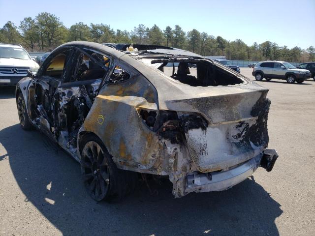 Photo 3 from auction – 2021 TESLA MODEL Y with VIN 5YJYGAEE9MF143321