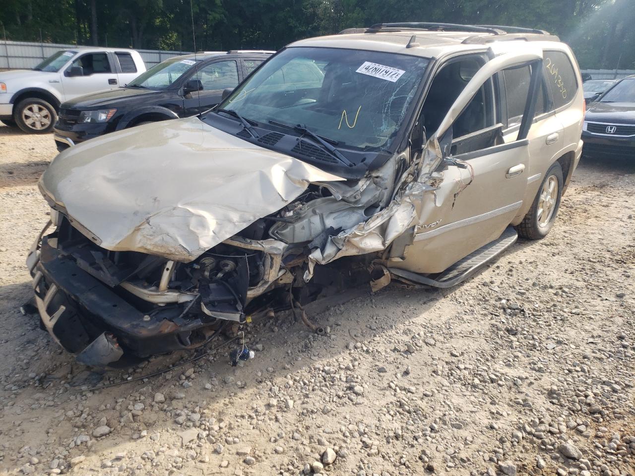 Photo 2 from auction – 2006 GMC ENVOY with VIN 1GKDS13S762211759