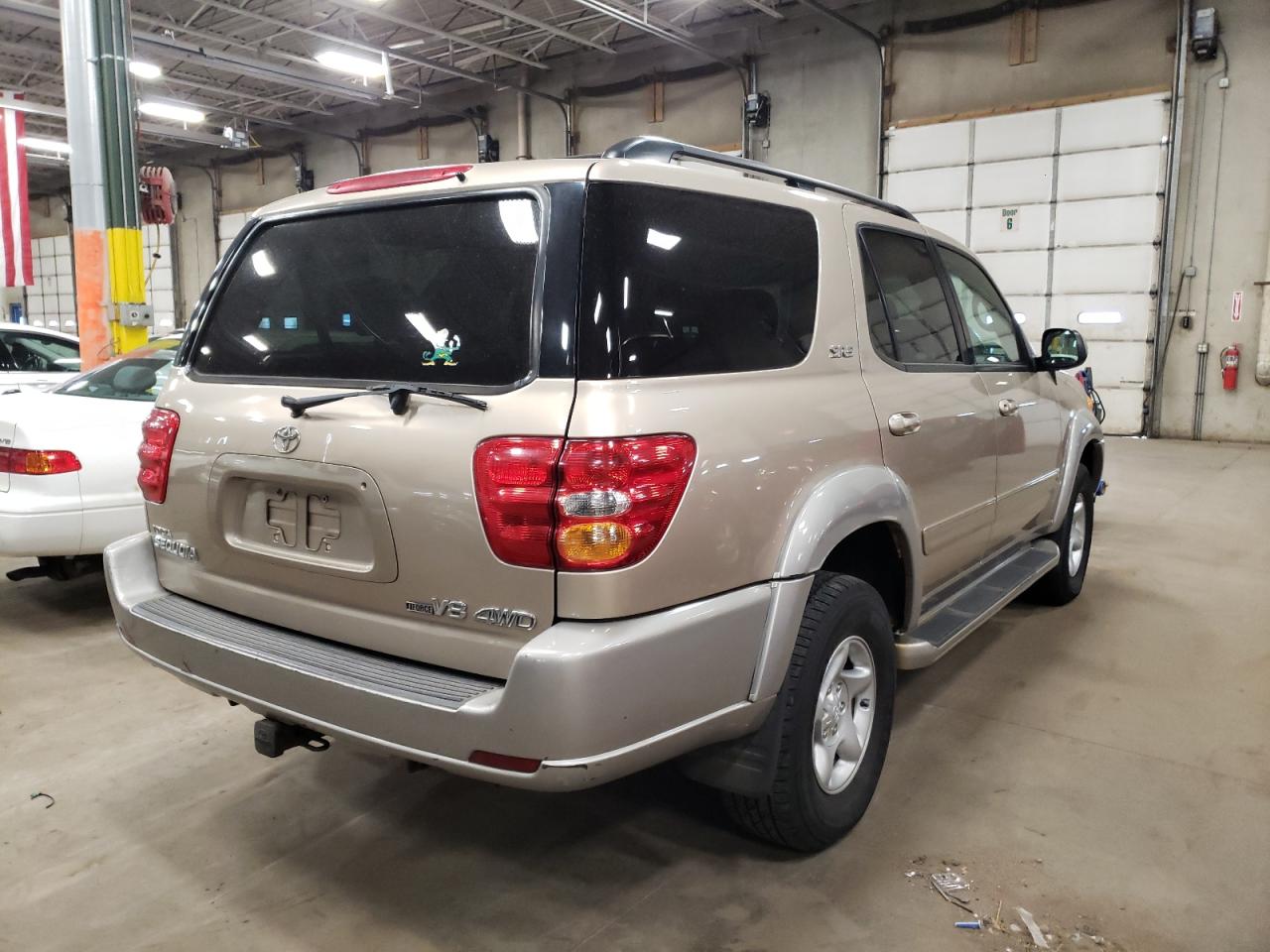 Photo 4 from auction – 2002 TOYOTA SEQUOIA SR with VIN 5TDBT44A62S071570