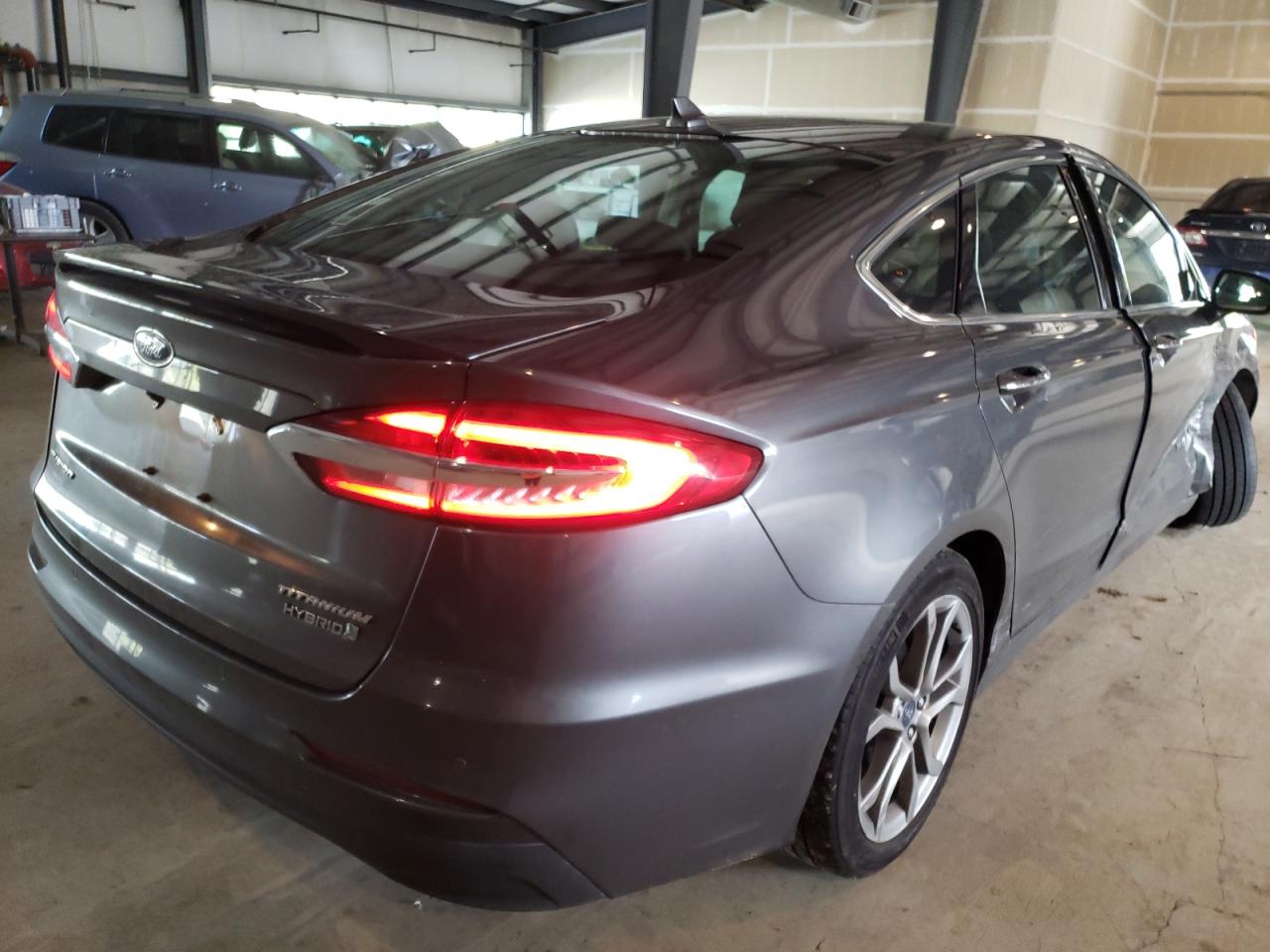 Photo 4 from auction – 2019 FORD FUSION TIT with VIN 3FA6P0RU3KR244066