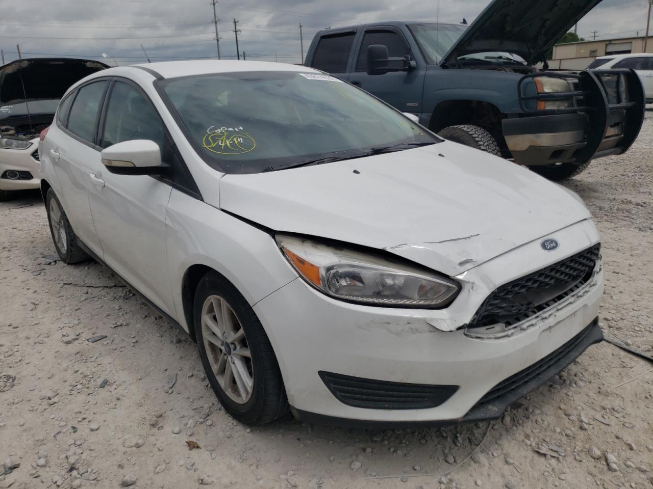 FORD FOCUS SE 2016 with VIN 1FADP3K24GL221807 - Photo from auction