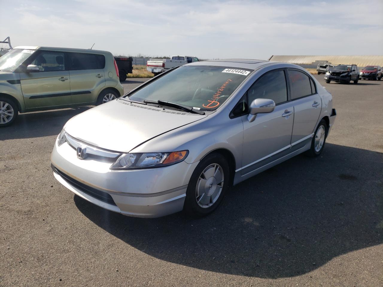 Photo 2 from auction – 2006 HONDA CIVIC HYBR with VIN JHMFA36266S005474