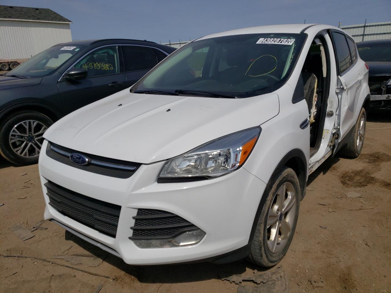 Photo 2 from auction – 2014 FORD ESCAPE SE with VIN 1FMCU9GX6EUD86623