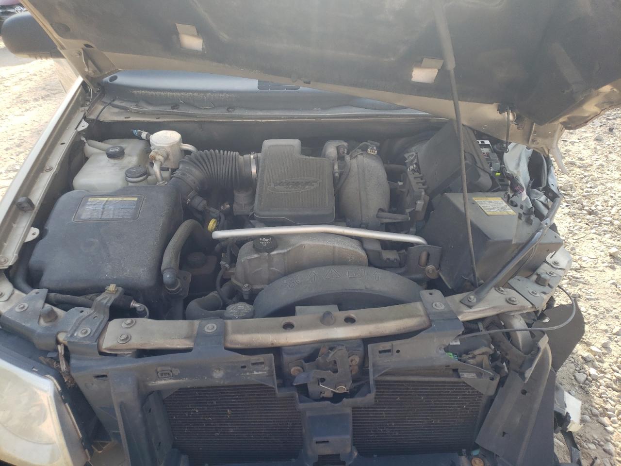 Photo 7 from auction – 2006 GMC ENVOY with VIN 1GKDS13S762211759