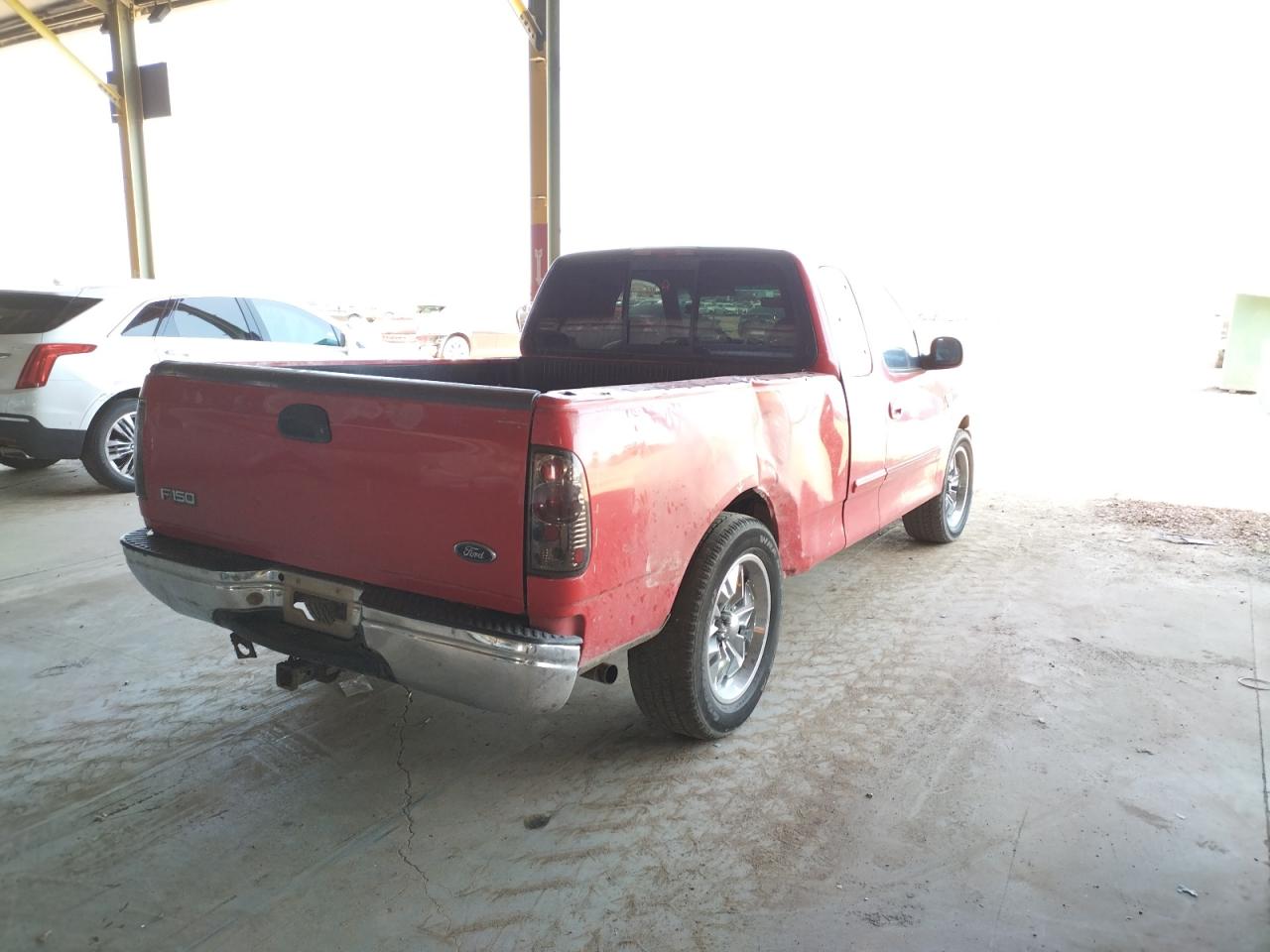 Photo 4 from auction – 1999 FORD F150 with VIN 1FTRX17W3XKB05052