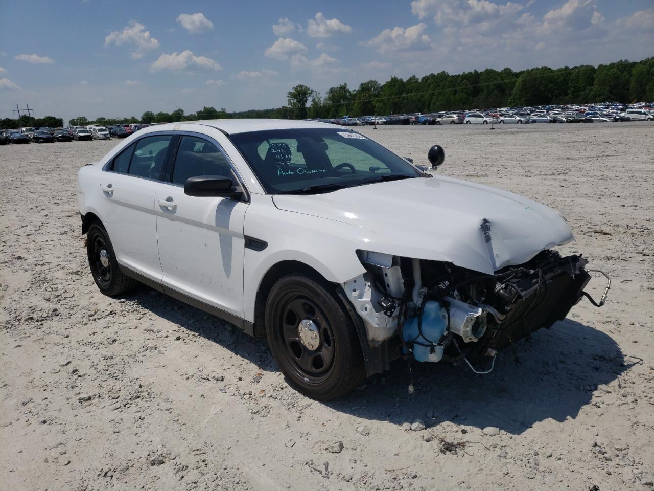 FORD TAURUS POL 2018 with VIN 1FAHP2MK4JG141822 - Photo from auction