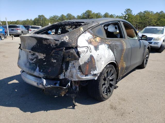 Photo 4 from auction – 2021 TESLA MODEL Y with VIN 5YJYGAEE9MF143321