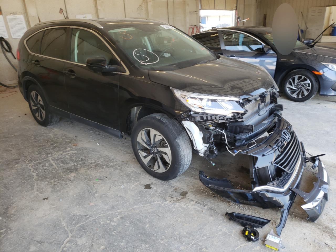 HONDA CR-V TOURI 2016 with VIN 5J6RM4H95GL046416 - Photo from auction