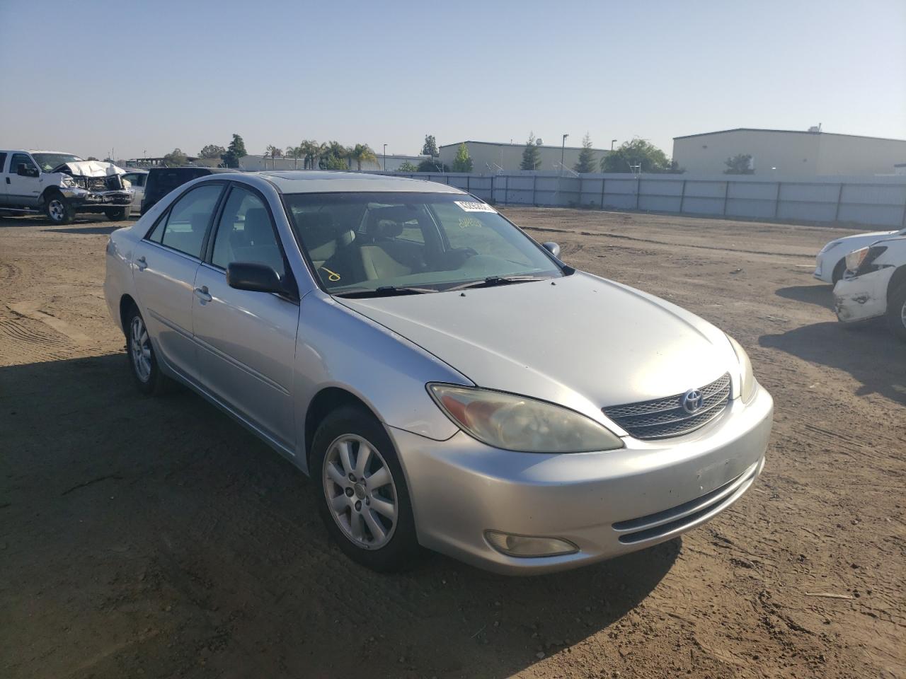TOYOTA CAMRY LE 2004 with VIN JTDBF32K140156061 - Photo from auction