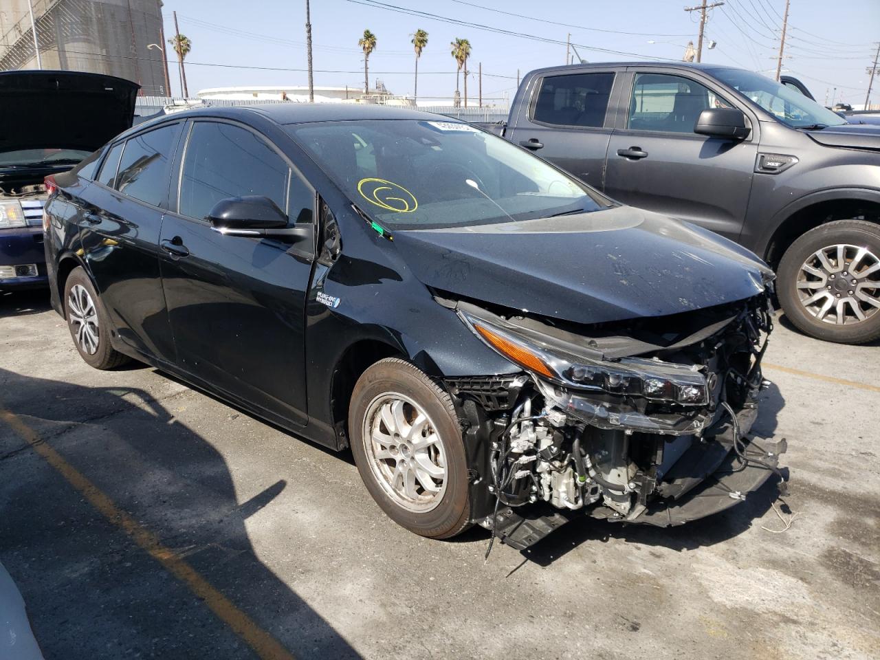 TOYOTA PRIUS PRIM 2022 with VIN JTDKAMFP3N3202273 - Photo from auction