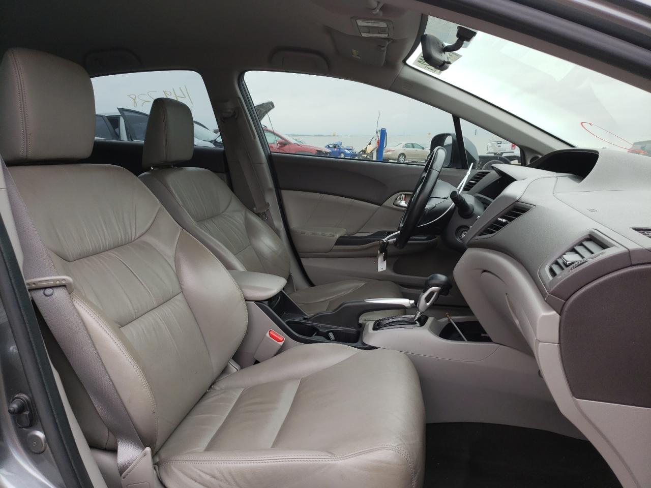 Photo 5 from auction – 2012 HONDA CIVIC HYBR with VIN JHMFB4F34CS005321
