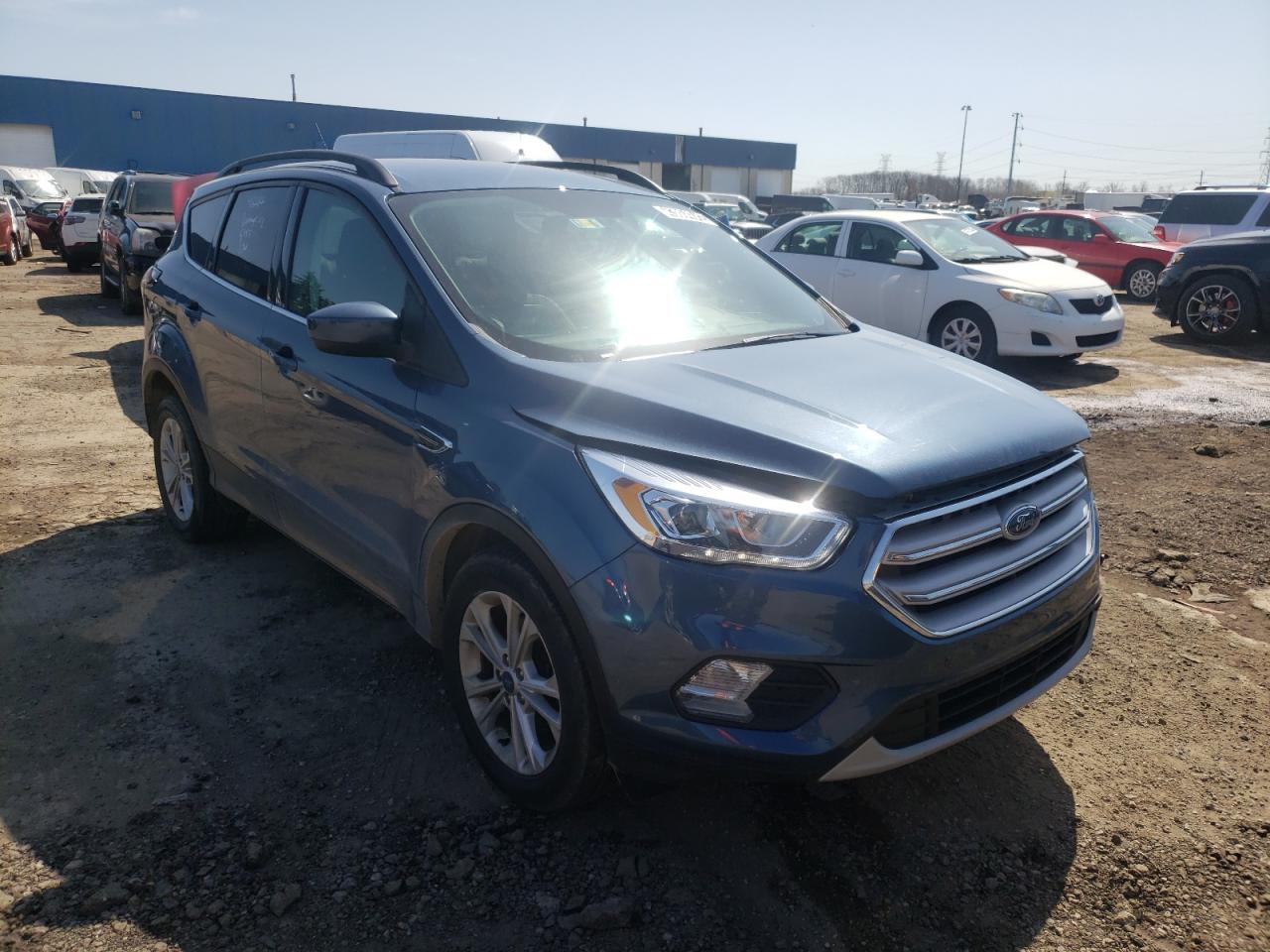 FORD ESCAPE SEL 2018 with VIN 1FMCU0HD8JUC57597 - Photo from auction