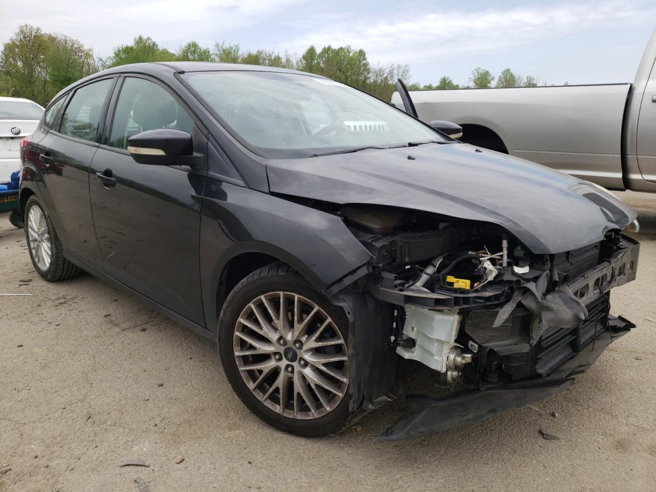 FORD FOCUS SE 2013 with VIN 1FADP3K29DL174527 - Photo from auction
