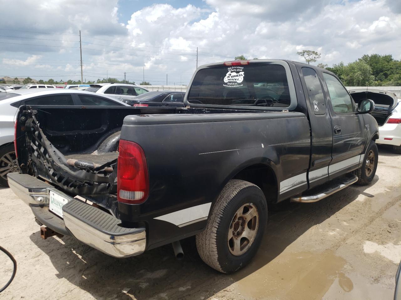 Photo 4 from auction – 1999 FORD F150 with VIN 2FTRX17L4XCA79474