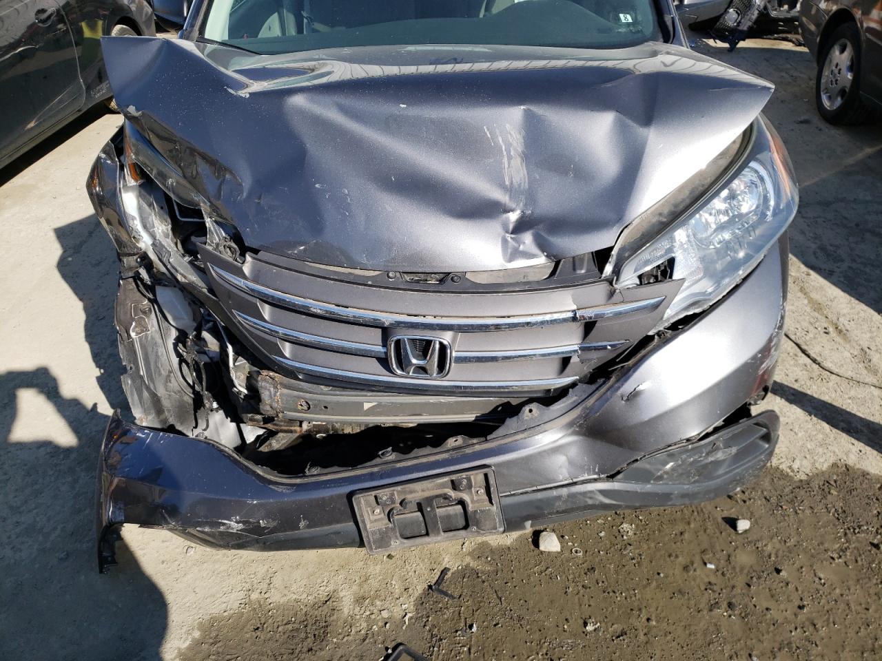 Photo 7 from auction – 2014 HONDA CR-V LX with VIN 2HKRM4H33EH694792