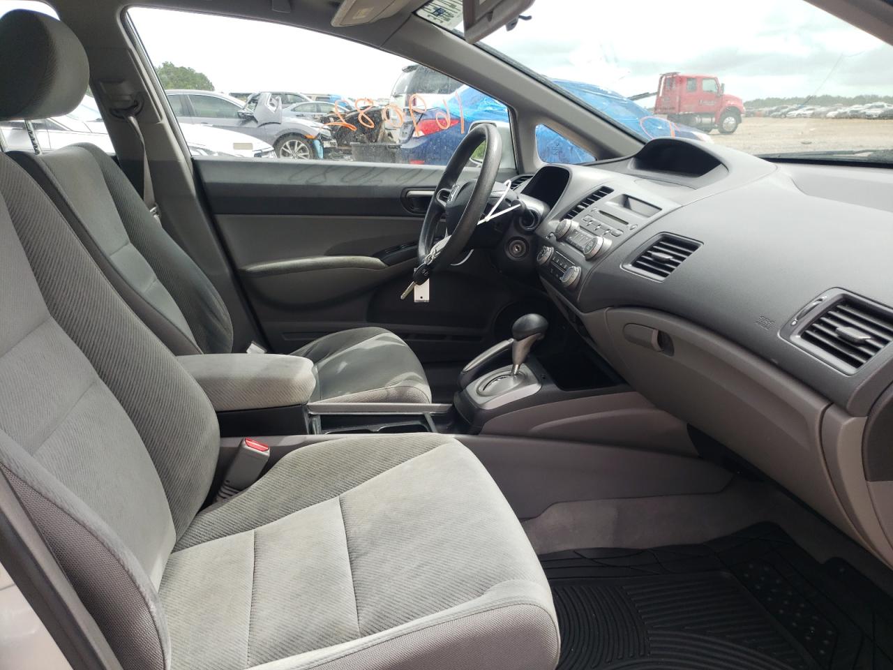 Photo 5 from auction – 2011 HONDA CIVIC LX with VIN 19XFA1F52BE012712