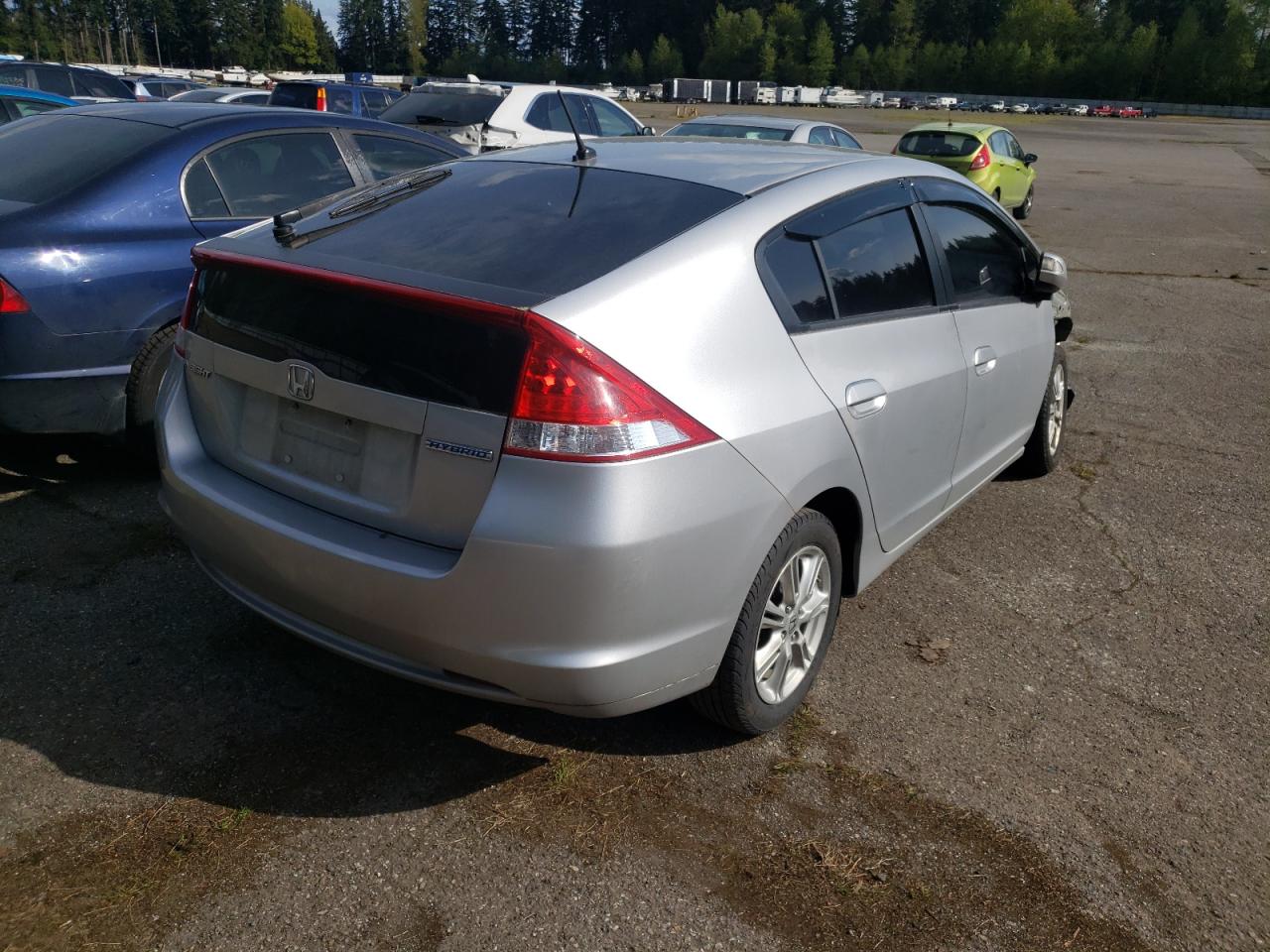 Photo 4 from auction – 2010 HONDA INSIGHT EX with VIN JHMZE2H77AS033149
