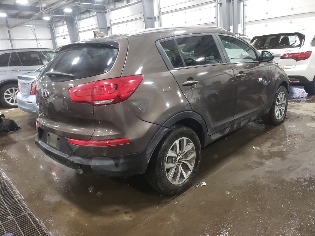 Photo 4 from auction – 2015 KIA SPORTAGE L with VIN KNDPBCAC5F7684630