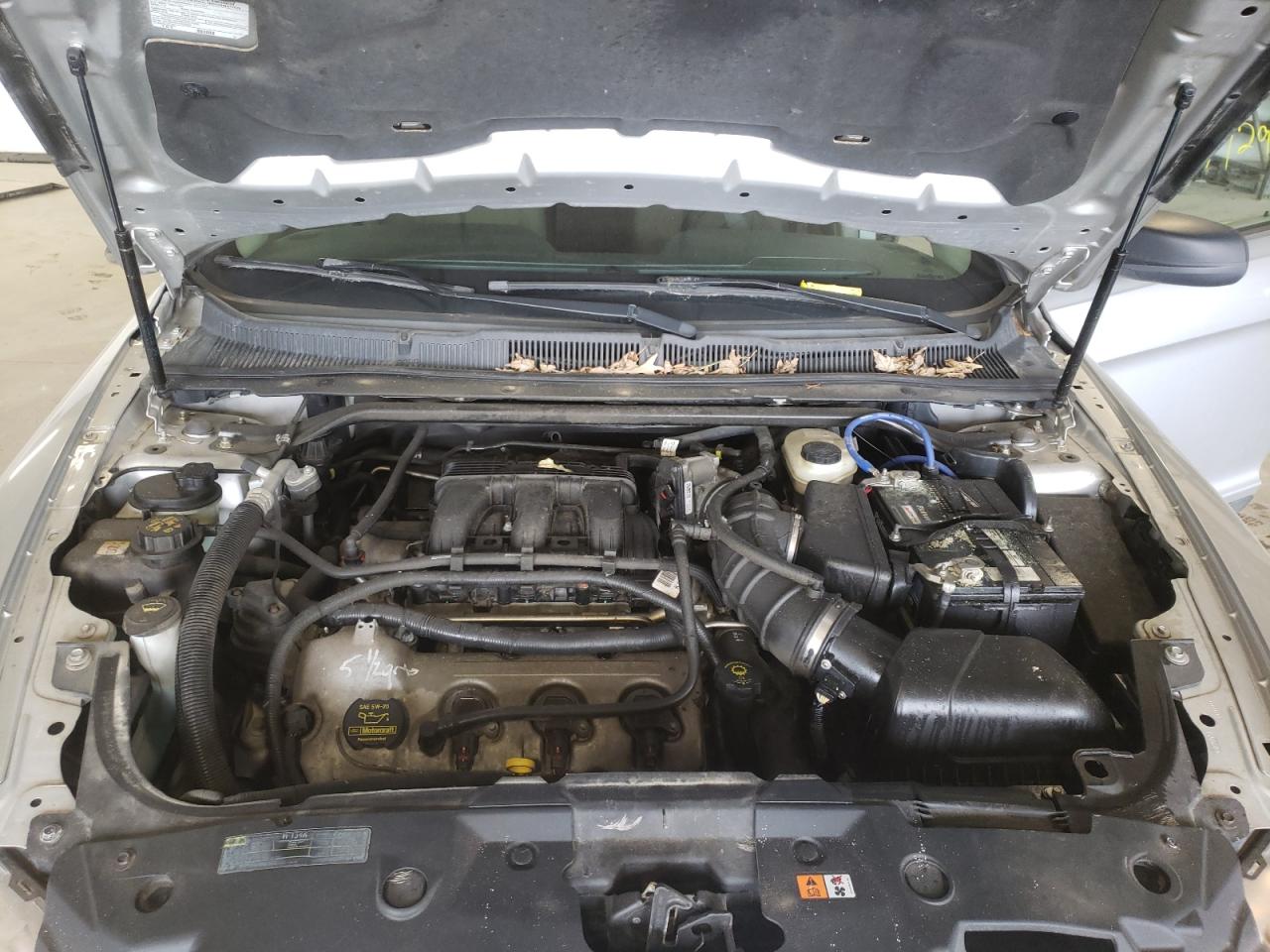 Photo 7 from auction – 2010 FORD TAURUS SE with VIN 1FAHP2DW7AG128954