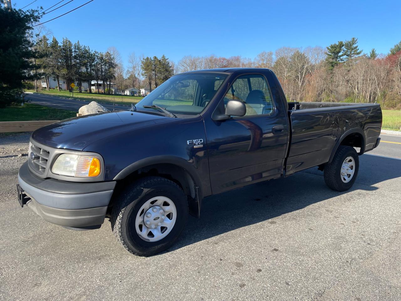 Photo 2 from auction – 2003 FORD F150 with VIN 2FTPF18L83CA59313