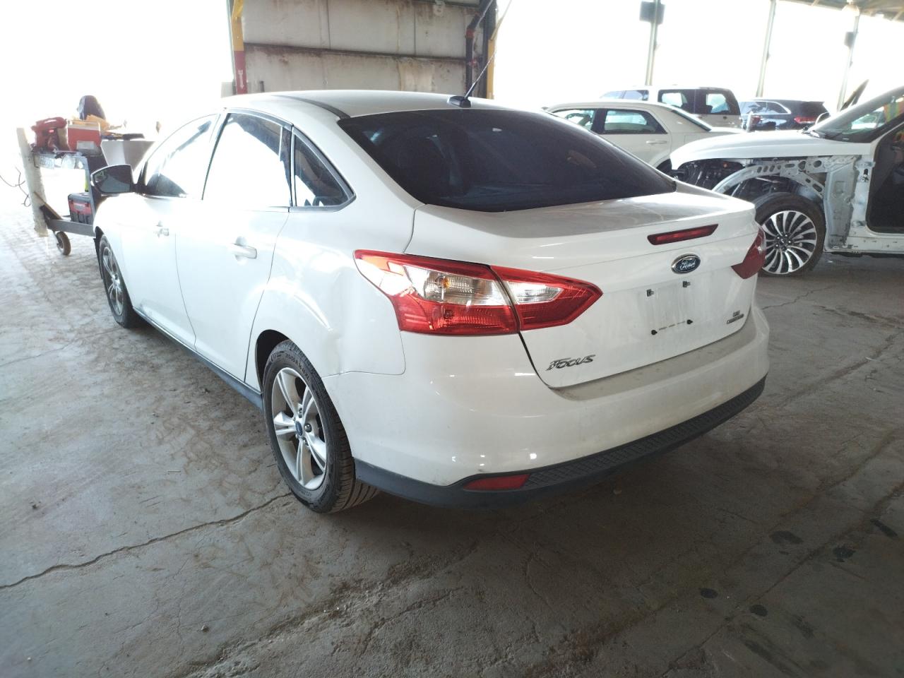 Photo 3 from auction – 2014 FORD FOCUS SE with VIN 1FADP3F25EL421084