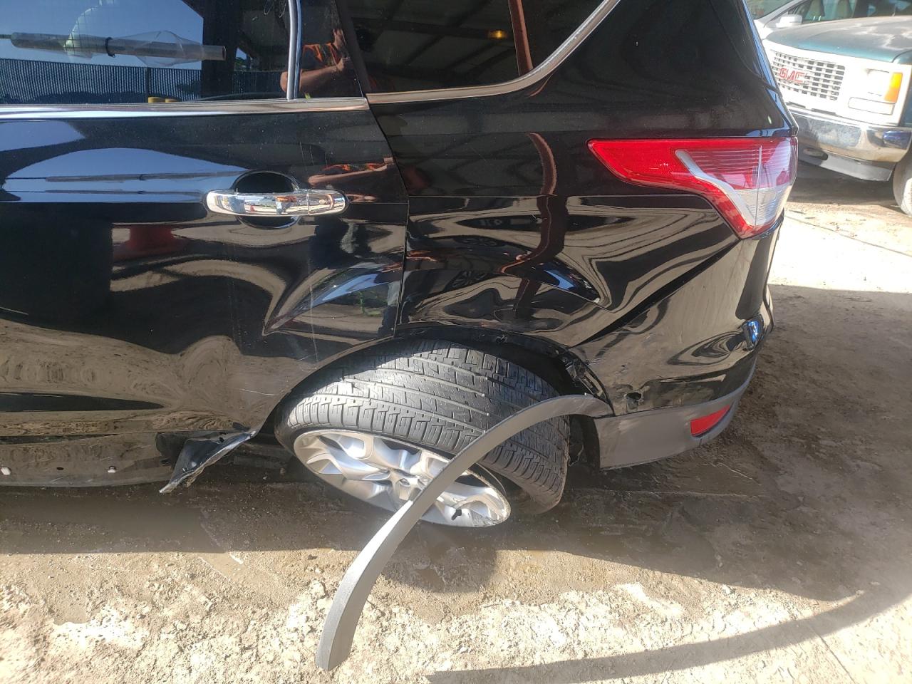 Photo 10 from auction – 2016 FORD ESCAPE TIT with VIN 1FMCU0J99GUA03623