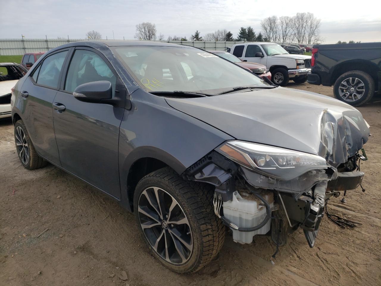 TOYOTA COROLLA L 2017 with VIN 5YFBURHE0HP658243 - Photo from auction