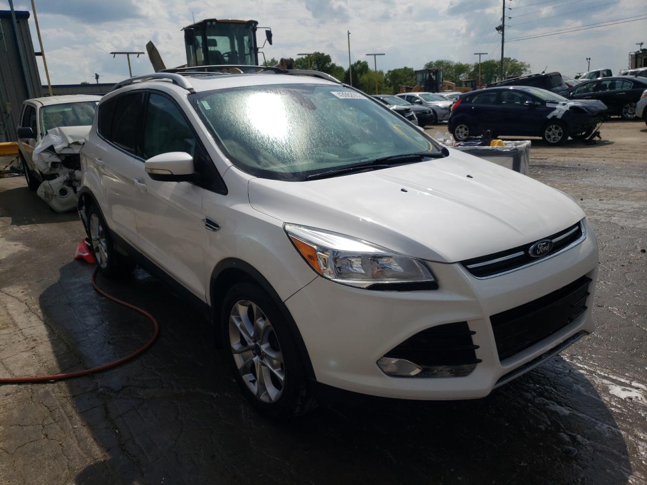 FORD ESCAPE TIT 2014 with VIN 1FMCU0JX3EUB00845 - Photo from auction