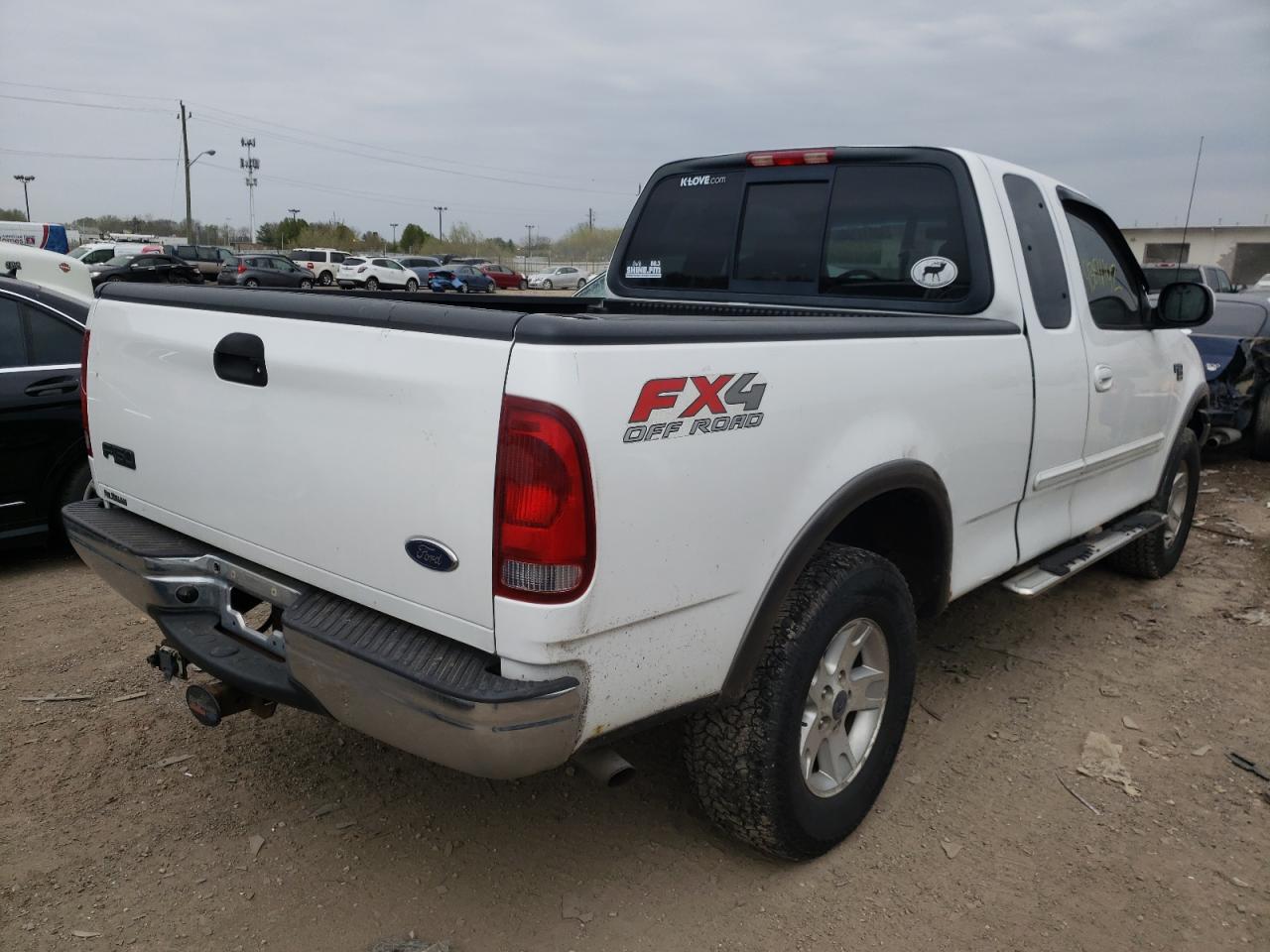 Photo 4 from auction – 2002 FORD F150 with VIN 1FTRX18L52NA84104