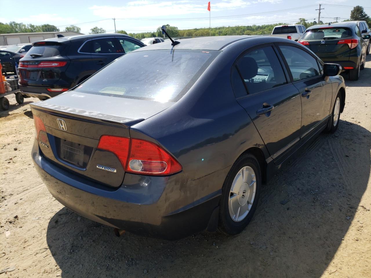 Photo 4 from auction – 2008 HONDA CIVIC HYBR with VIN JHMFA36228S009928