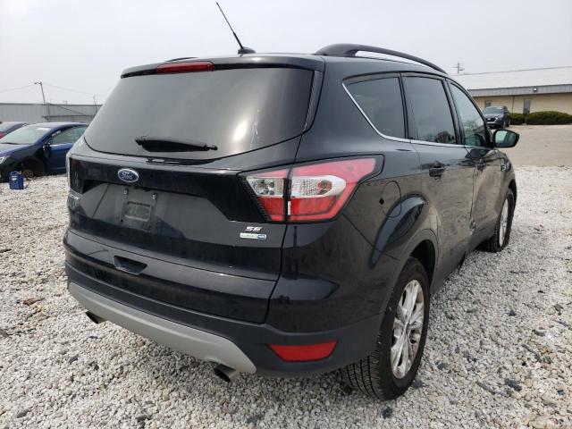 Photo 4 from auction – 2018 FORD ESCAPE SE with VIN 1FMCU9GD9JUA75302