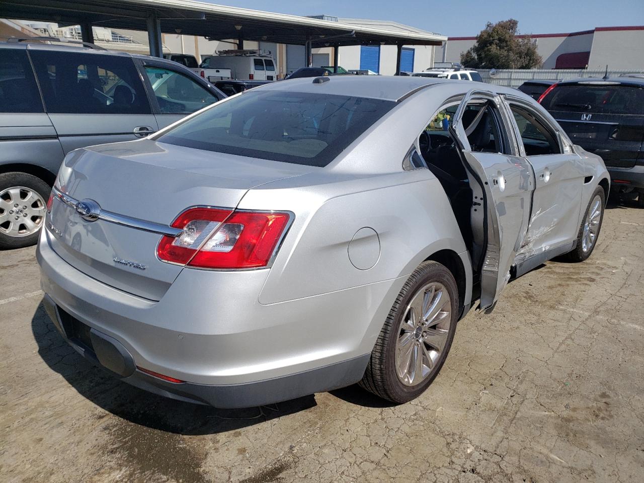 Foto 4 de la subasta – 2012 FORD TAURUS LIM con VIN 1FAHP2FW8CG103223