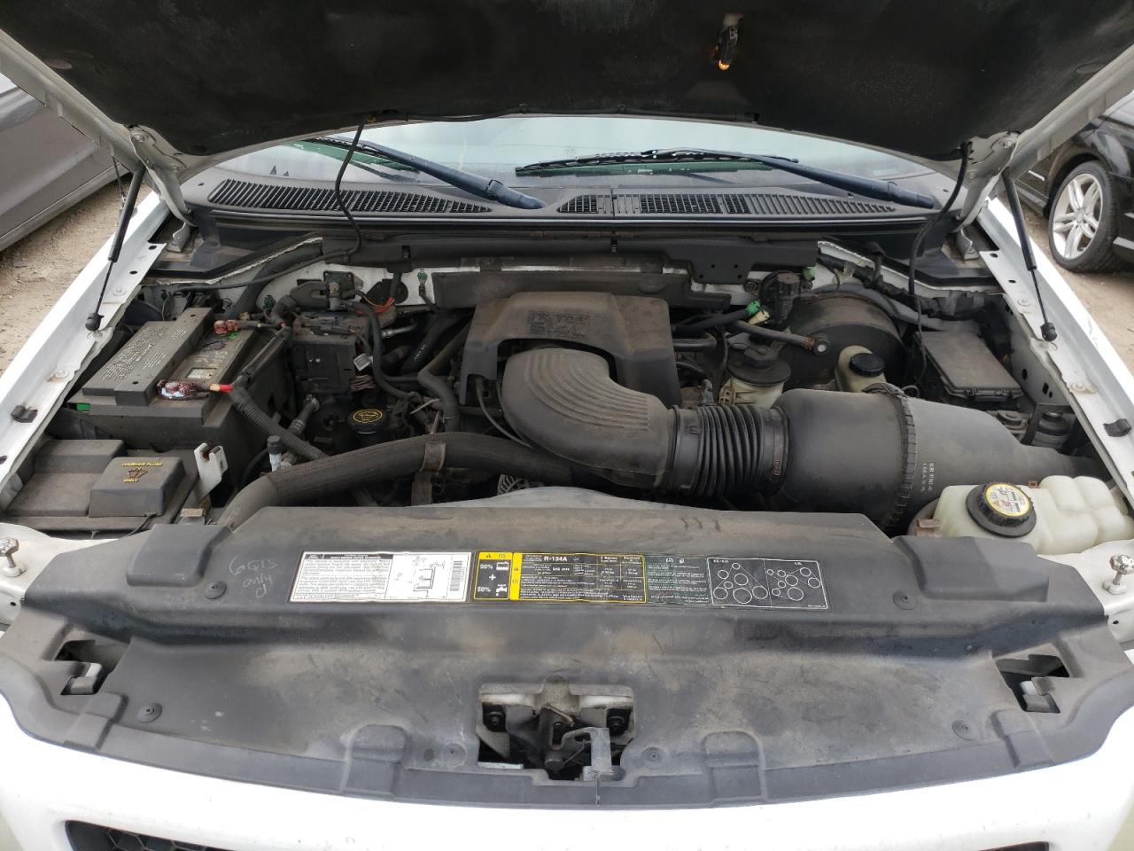 Photo 7 from auction – 2002 FORD F150 with VIN 1FTRX18L52NA84104