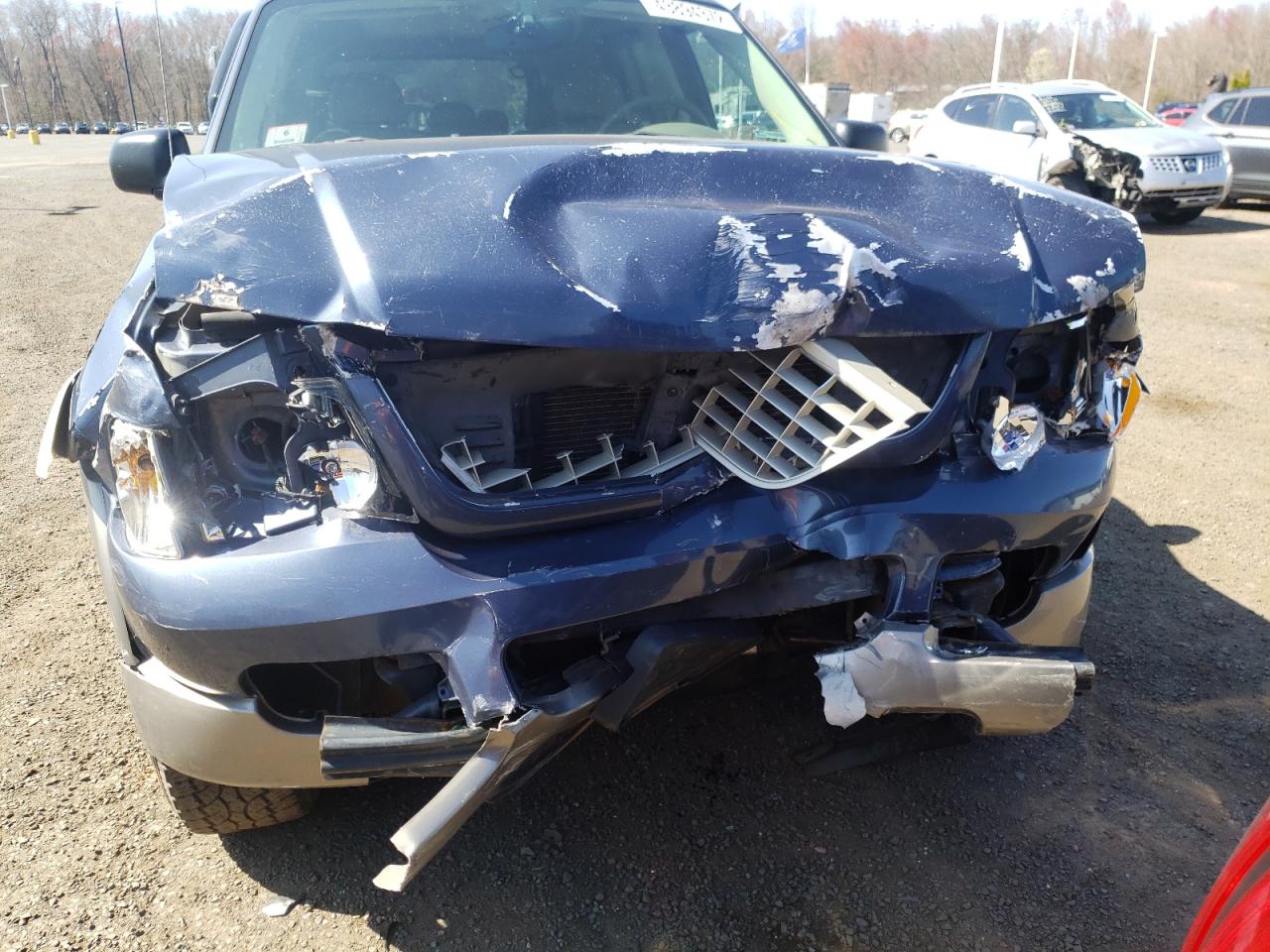 Photo 9 from auction – 2004 FORD EXPLORER E with VIN 1FMDU74W94ZA52124