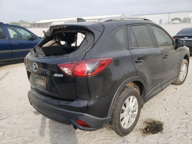 Photo 4 from auction – 2014 MAZDA CX-5 SPORT with VIN JM3KE2BE4E0341088