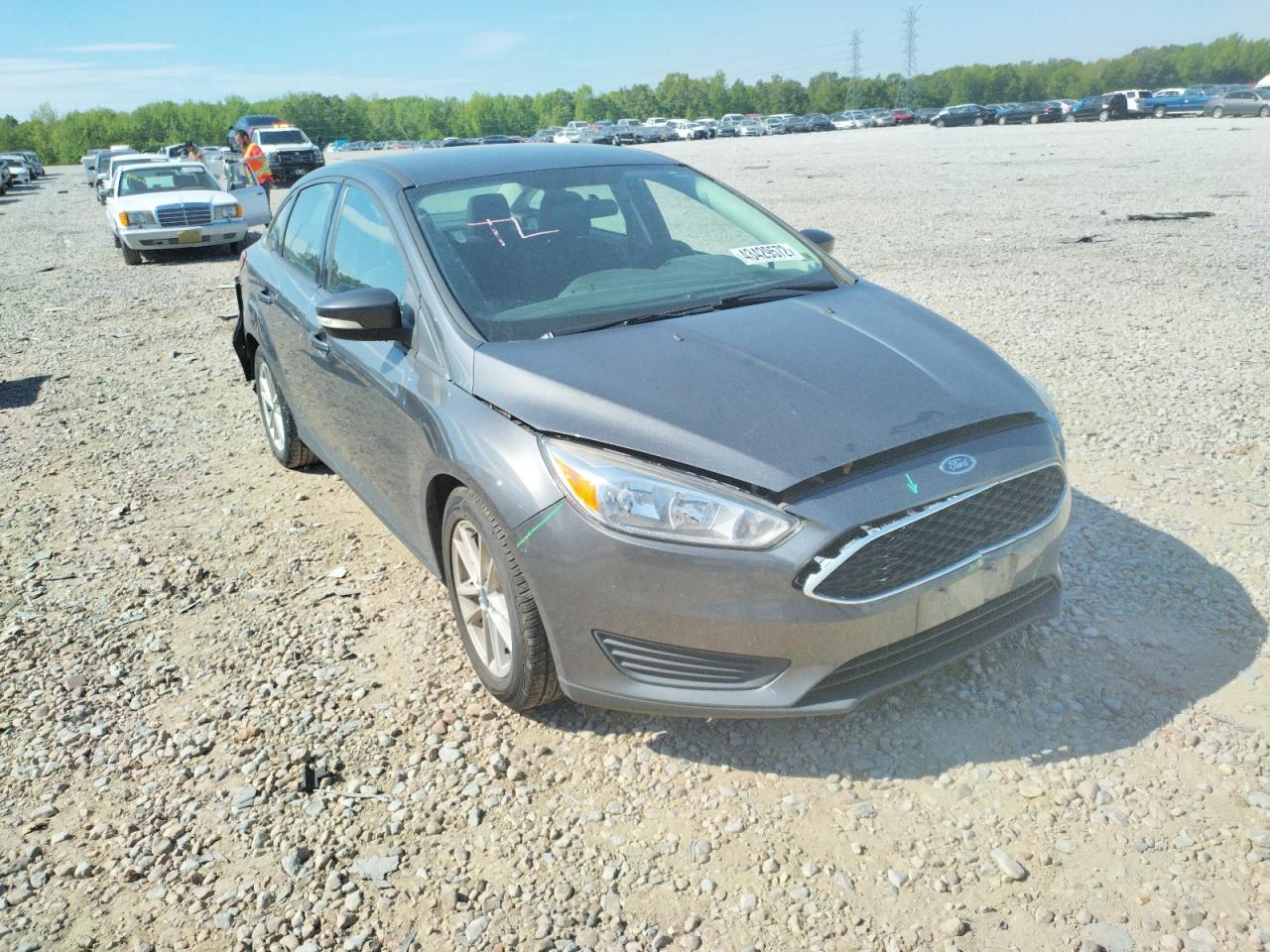 FORD FOCUS SE 2017 with VIN 1FADP3F23HL316645 - Photo from auction