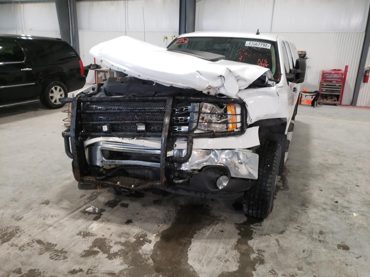 Photo 9 from auction – 2014 GMC SIERRA K35 with VIN 1GT423CG5EF180134