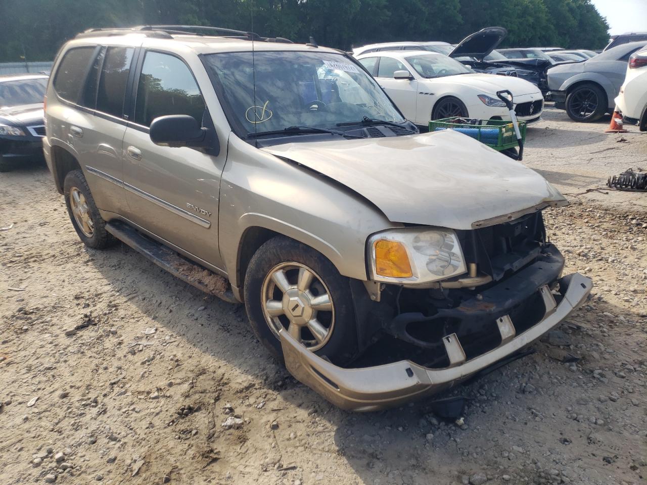GMC ENVOY 2006 with VIN 1GKDS13S762211759 - Photo from auction