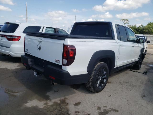 Photo 4 from auction – 2021 HONDA RIDGELINE with VIN 5FPYK3F15MB008771