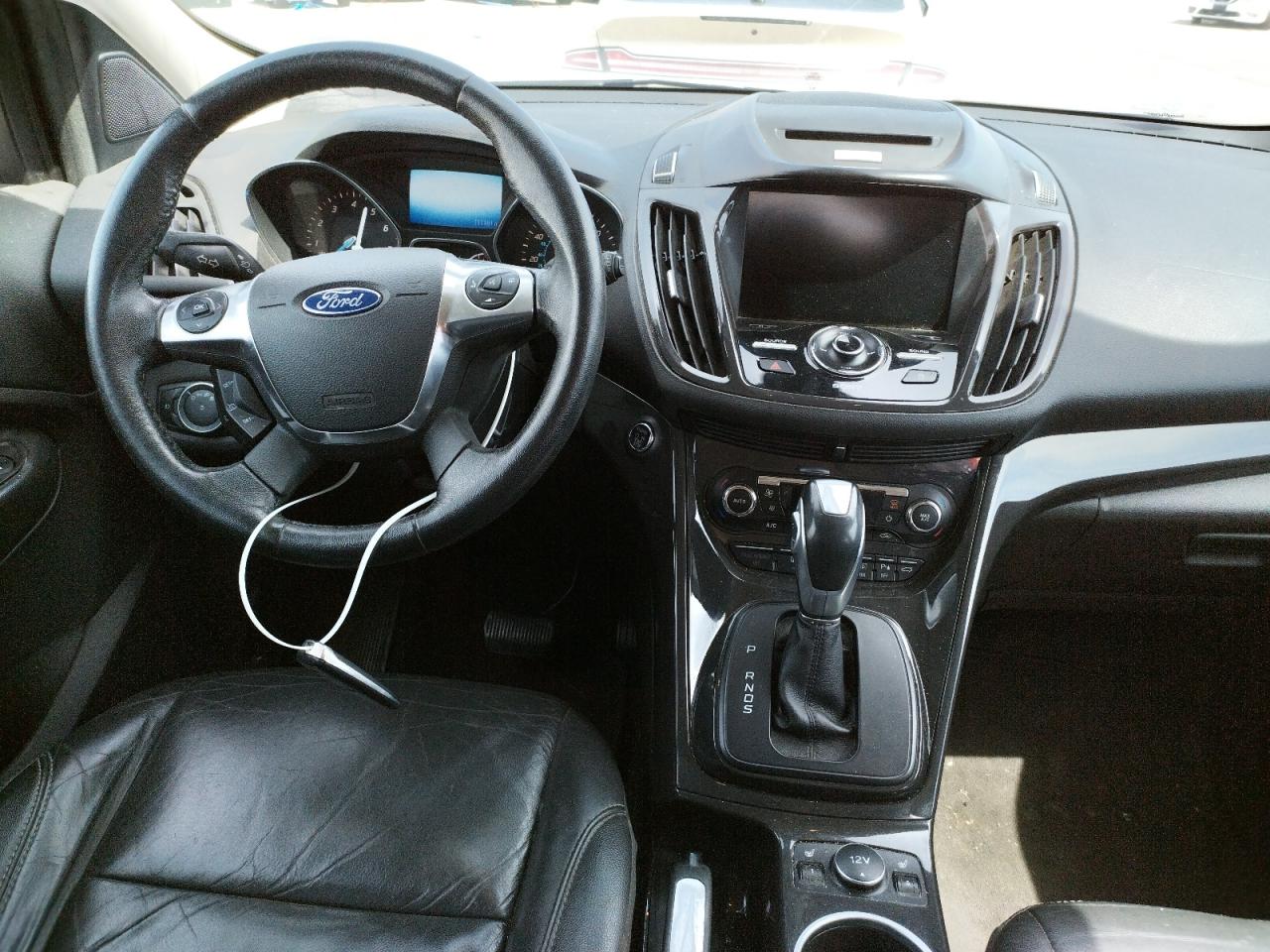 Photo 9 from auction – 2015 FORD ESCAPE TIT with VIN 1FMCU9J97FUC43790