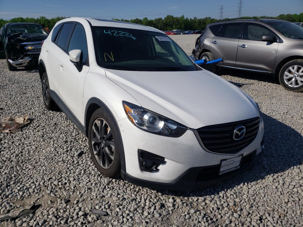 MAZDA CX-5 GT 2016 with VIN JM3KE4DYXG0800565 - Photo from auction