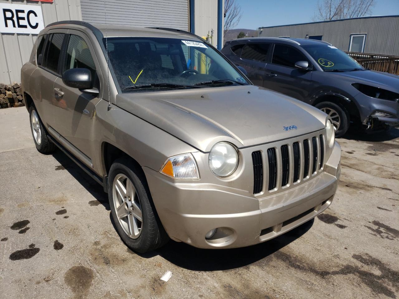 JEEP COMPASS SP 2010 with VIN 1J4NF1FB8AD620165 - Photo from auction