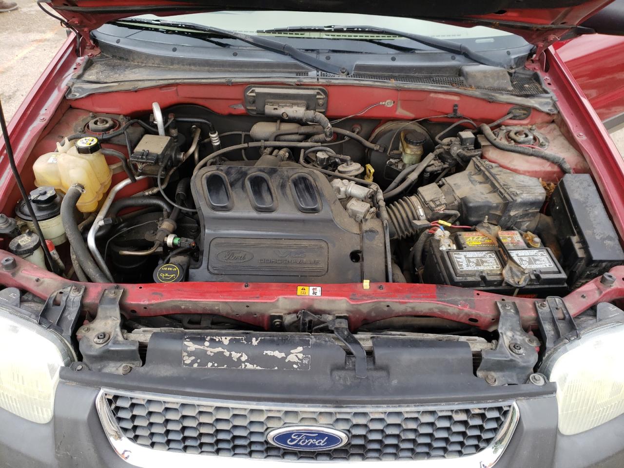 Photo 7 from auction – 2003 FORD ESCAPE XLT with VIN 1FMYU03173KB75779