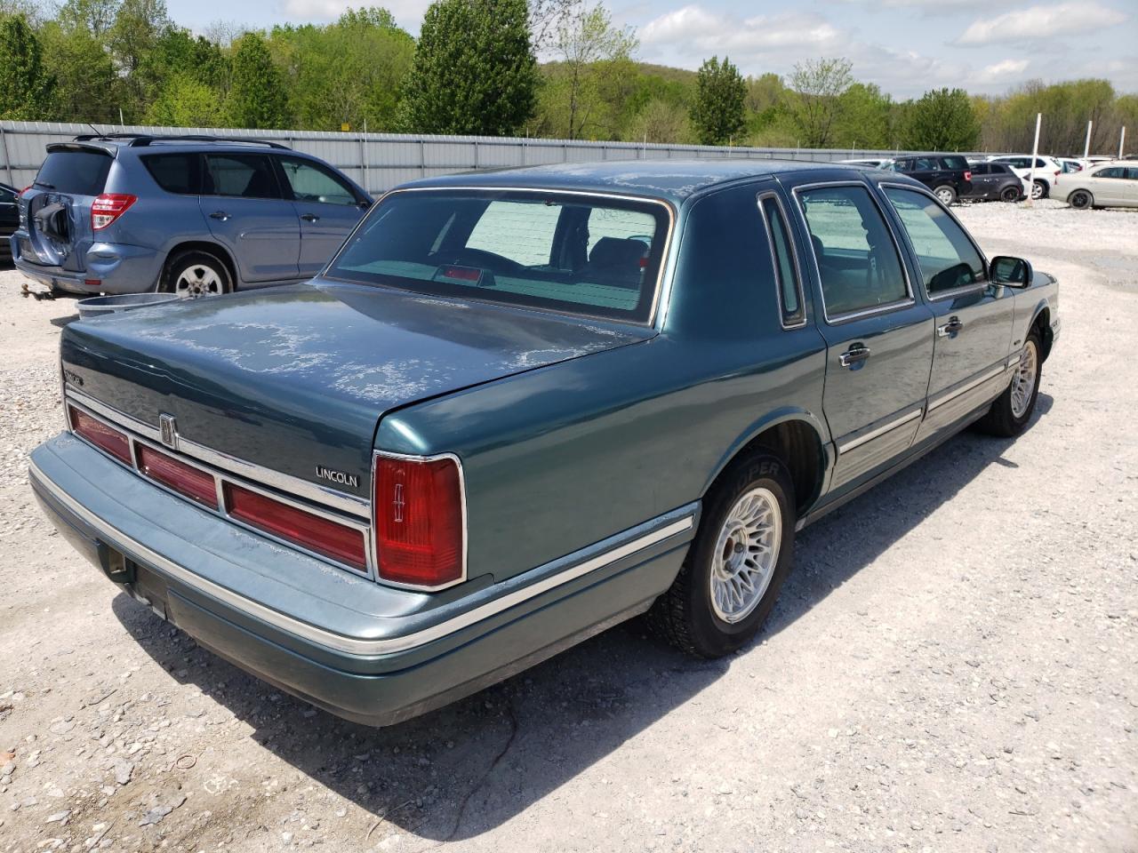 Photo 4 from auction – 1995 LINCOLN TOWN CAR E with VIN 1LNLM81W0SY697270
