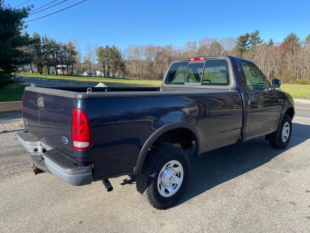 Photo 4 from auction – 2003 FORD F150 with VIN 2FTPF18L83CA59313